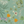Eden wallpaper by Deus ex Gardenia in sage green, flat sample of lush leaves and fruit