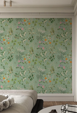Eden wallpaper by Deus ex Gardenia in sage green, lush leaves and fruit in a living room