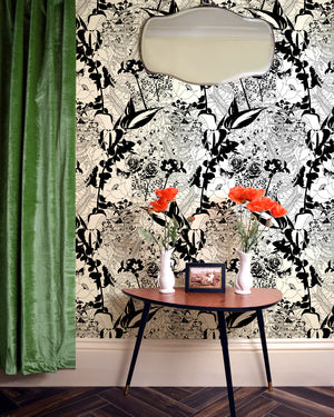 English Garden wallpaper by Dupenny in black and white, bold garden flowers in a styled room setting