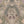 Exotica wallpaper by Victoria Sanders in dusty pink, flat sample of jungle animals and tropical flowers