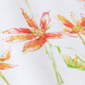Dancing Autumn Daisies linen by Seed Home Designs in orange and green, pattern sample of orange daisies on tall stems