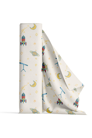 Float Away into Space linen by Annika Reed in cream, in soft folds showing rockets, moons and planets