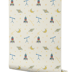 Float Away in Space wallpaper by Annika Reed in cream, roll showing rockets, moons and planets