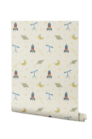 Float Away in Space wallpaper by Annika Reed in cream, roll showing rockets, moons and planets