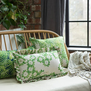 Folio linen by Bethie Tricks in green and white, a leaf medallion print made into a cushion