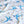 Forget Me Not Swallow fabric by Seed Home Designs in blue and white, draped, showing swallows and forget-me-nots