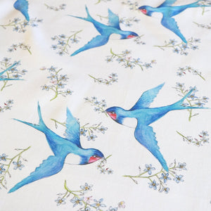 Forget Me Not Swallow fabric by Seed Home Designs in blue and white, full repeat of swallows and forget-me-nots