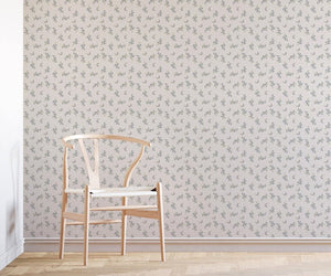 Forget Me Not wallpaper by Seed Home Designs in blue and green, scattered forget-me-nots in a living room