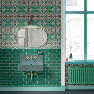 Franny wallpaper by Tatie Lou in green, a kaleidoscopic floral in a bathroom