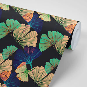 Ginkgo wallpaper by Tatie Lou in black, sample roll showing oversized ginkgo leaves