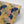 Ginkgo wallpaper by Tatie Lou in yellow, roll showing oversized ginkgo leaves