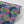Ginkgo wallpaper by Tatie Lou in purple, sample roll showing oversized ginkgo leaves