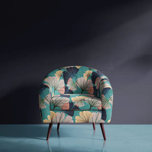 Ginkgo velvet by Tatie Lou in navy, oversized ginkgo leaves upholstered on an armchair