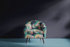 Ginkgo velvet by Tatie Lou in navy, oversized ginkgo leaves upholstered on an armchair