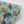 Ginkgo wallpaper by Tatie Lou in blue, roll showing oversized ginkgo leaves