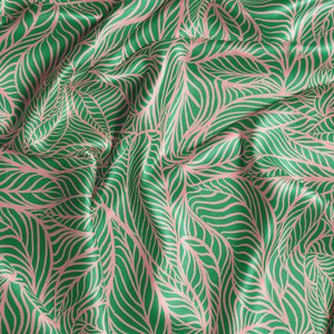 Agnes Lustre velvet by Tatie Lou in green and pink, roll showing swirling wave lines