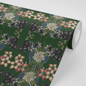 Hampi wallpaper by Tatie Lou in dark green, full repeat of tropical flowers in a mirrored print
