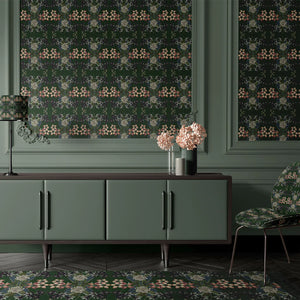 Hampi wallpaper by Tatie Lou in dark green, tropical flowers in a mirrored print behind a console table