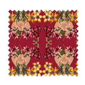Hampi velvet by Tatie Lou in red, tropical flowers in a mirrored print as a cushion
