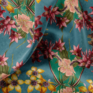 Hampi velvet by Tatie Lou in teal, draped, showing tropical flowers in a mirrored print