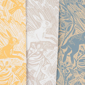 Harvest Hare wallpaper by St. Jude's in white, roll showing hares among grasses