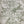 Harvest Hare wallpaper by St. Jude's in grey-green, flat sample of hares among grasses
