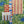Heatwave linen by Bethie Tricks in orange and pink, detail of wavy block-print stripes