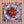 Heatwave linen by Bethie Tricks in orange and pink, close view of wavy block-print stripes