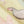Hen fabric by Seed Home Designs in pale yellow, draped, showing watercolour hens