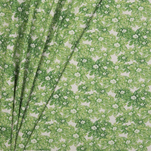 Hepta linen by Bethie Tricks in green, draped, showing leafy rosettes