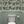 Hot Air Balloons wallpaper by Dami and Em Design in light green, hot-air balloons on a bathroom wall
