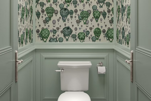 Hot Air Balloons wallpaper by Dami and Em Design in light green, hot-air balloons on a bathroom wall