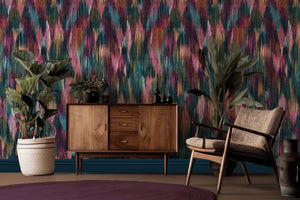 Spectre Ikat wallpaper by Victoria Sanders in multicolour, a blurred ikat design in a living room
