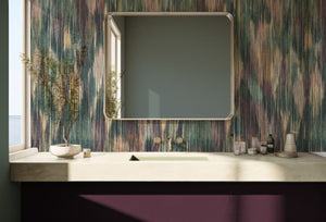 Spectre Ikat wallpaper by Victoria Sanders in red, a blurred ikat design on a bathroom wall