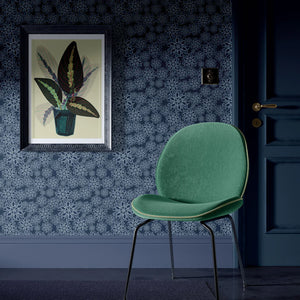 Indigo Nui wallpaper by Tatie Lou in indigo blue, nui shibori dots in a living room