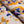 Inky linen by Bethie Tricks in blue and orange, draped, showing inky blots