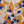 Inky linen by Bethie Tricks in blue and orange, close-up of inky blots