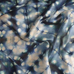 Indigo Itajime velvet by Tatie Lou in blue, draped, showing itajime shibori folds (alternate view)