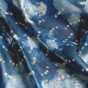 Indigo Itajime velvet by Tatie Lou in blue, in soft folds showing itajime shibori folds