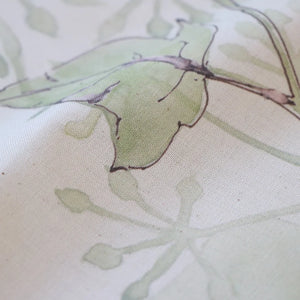 Wrens in the Ivy linen by Seed Home Designs in cream and green, in soft folds showing wrens among ivy (second view)