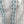 Ivy linen by Annika Reed in blue and red, draped, showing ivy trails and stripes