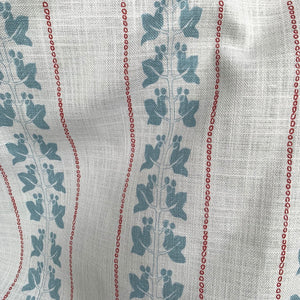 Ivy linen by Annika Reed in blue and red, draped, showing ivy trails and stripes