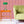 Lumiere wallpaper by Tatie Lou in pink, an Art Deco medallion in a living room