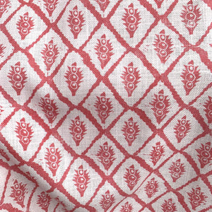 Jaipur linen by Annika Reed in red, draped, showing block-print medallions