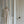 Jester Lines wallpaper by Annika Reed in blue, wavy jester lines in a hallway
