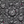 Jewelled Orchard wallpaper by Dami and Em Design in black and white, partly unrolled roll showing