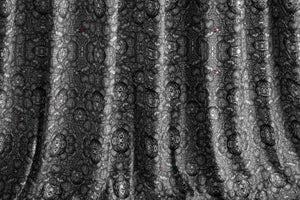 Jewelled Orchard velvet by Dami and Em Design in black, draped, showing a jewelled ornamental pattern