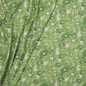 Jungle linen by Bethie Tricks in green, in soft folds showing jungle leaves