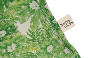 Jungle linen by Bethie Tricks in green, flat sample of jungle leaves