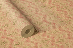 Lace wallpaper by Dami and Em Design in light green, partly unrolled roll showing a lace pattern